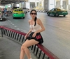 Hoa hậu Thùy Tiên gâysốt trên đường phố Thái Lan khi mặc váy siêu ngắn chỉnh giày